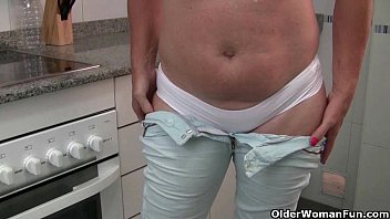 Grandma wears see through white pants and masturbates